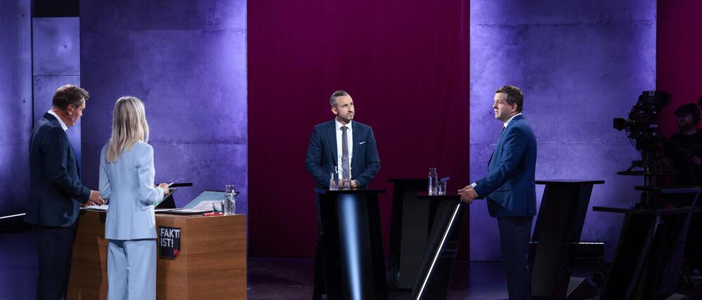 Sven Schulze und Ulrich Siegmund im MDR-TV-Duell, links die Moderatoren